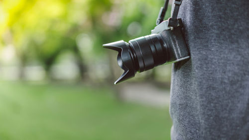 Close-up of camera photographing outdoors