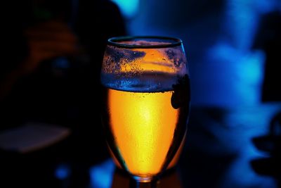 Close-up of beer glass at bar