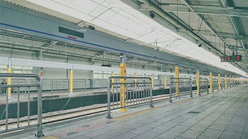 Train at railroad station platform