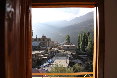 Buildings seen through window