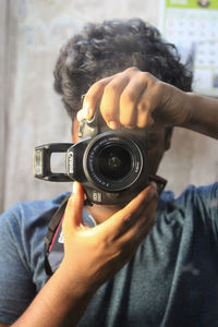 Portrait of man photographing
