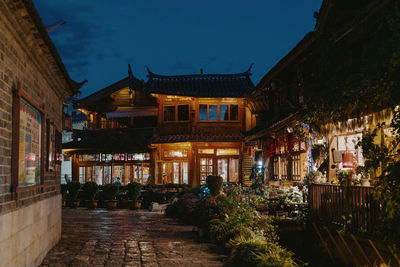 Buildings in city at night