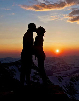 sunset, silhouette, lifestyles, leisure activity, winter, sun, sky, men, snow, orange color, cold temperature, mountain, landscape, scenics, beauty in nature, tranquil scene, tranquility, togetherness