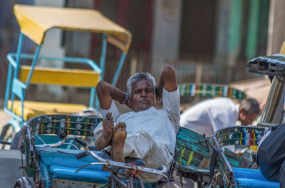 Man riding motorcycle in city