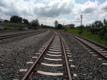 Railroad tracks against sky