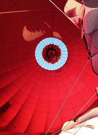 Low angle view of colorful lights hanging on ceiling