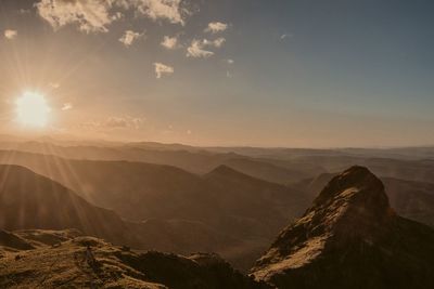 Scenic view of mountains against sky during sunset