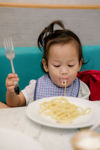 Portrait of a girl eating food