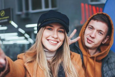Portrait of smiling young couple outdoor