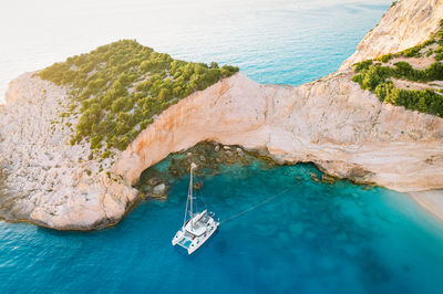 Aerial view of catamaran in bay on greek island