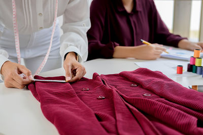 Close-up of people working