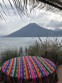 Colourful table facing the volcano at laguna atitlan guatemala 