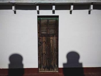 Shadow of people on wall