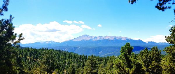 Scenic view of lake with mountains in background