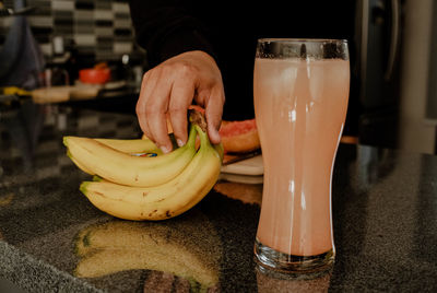 Midsection of man preparing food