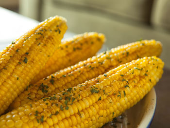 Close-up of corn on table