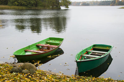 Boat moored at lakeshore