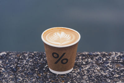 Close-up of coffee cup on table