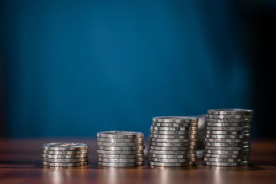 Stack of coins on table