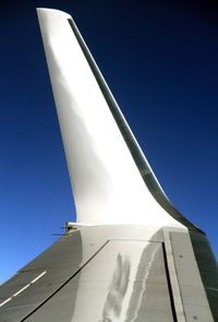 Low angle view of building against clear blue sky