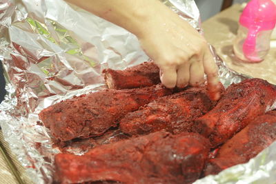 Close-up of hands preparing food