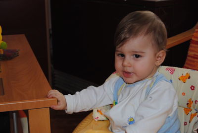 Portrait of cute baby at home