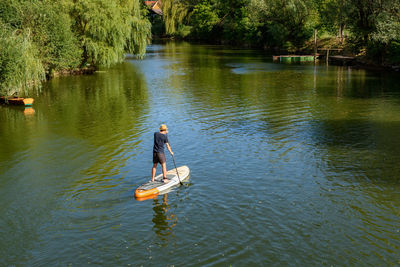 Man fishing in lake