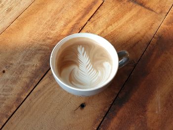 High angle view of cappuccino on table