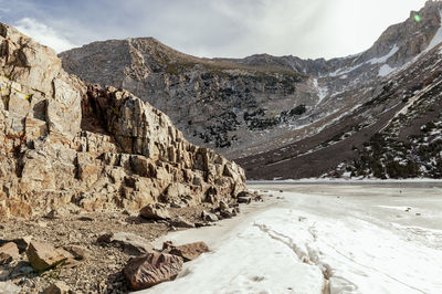 Scenic view of snowcapped mountains against sky