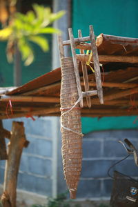 Close-up of rope tied on wood