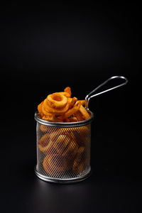 High angle view of drink in container against black background