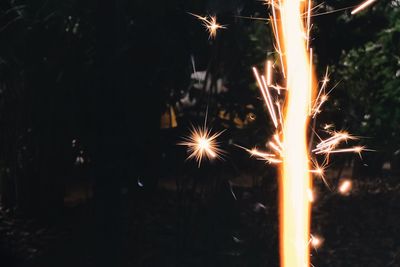 Close-up of firework display at night