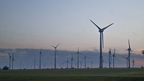 Wind turbines on field