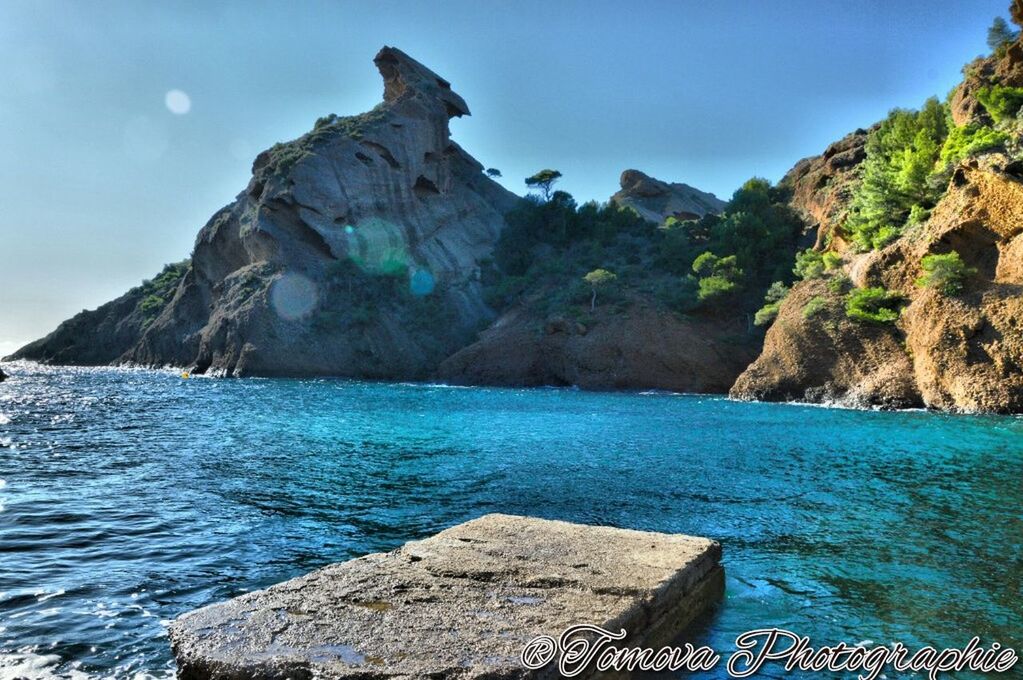 SCENIC VIEW OF SEA AND MOUNTAINS