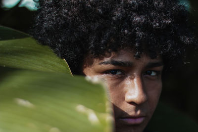 Close-up portrait of young man in park