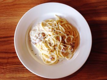 Directly above shot of noodles in bowl on table