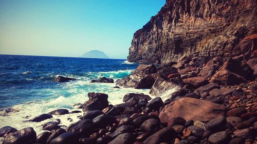 Scenic view of sea against clear sky