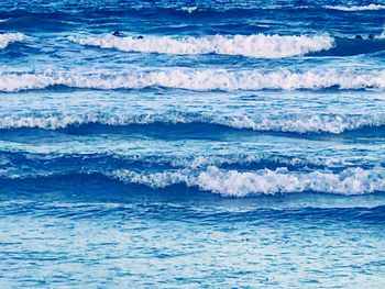 Scenic view of sea against blue sky