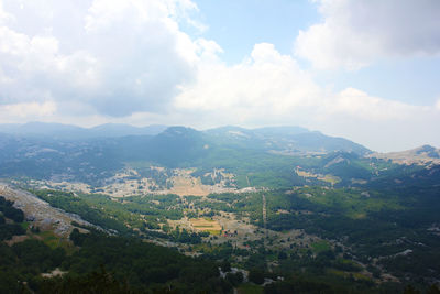 Aerial view of townscape against sky