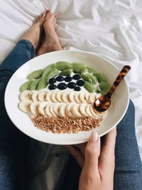 Midsection of woman holding food