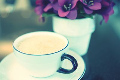 Close-up of coffee cup on table