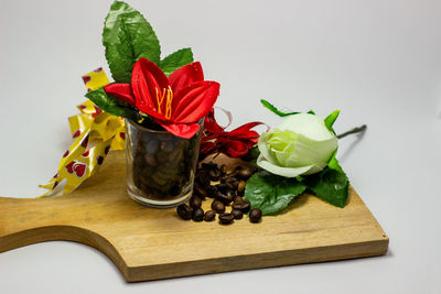 Close-up of rose plant on table