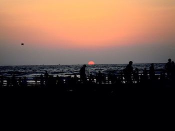 Scenic view of sea at sunset