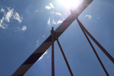 Low angle view of windmill against sky