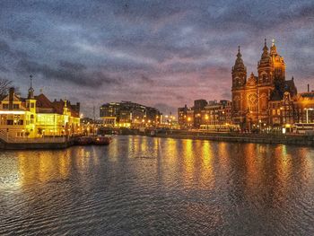 Reflection of illuminated buildings in water