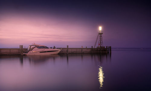 Scenic view of sea against sky at night