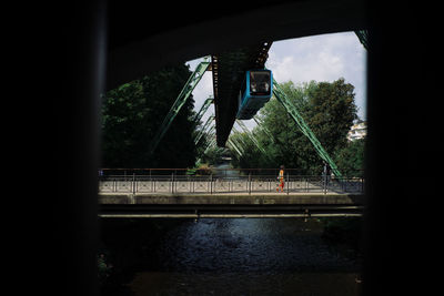 Bridge over river against sky