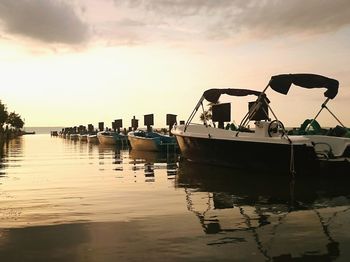 Boats moored in calm sea