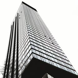 Low angle view of modern building against clear sky
