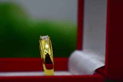 Close-up of wedding ring in box